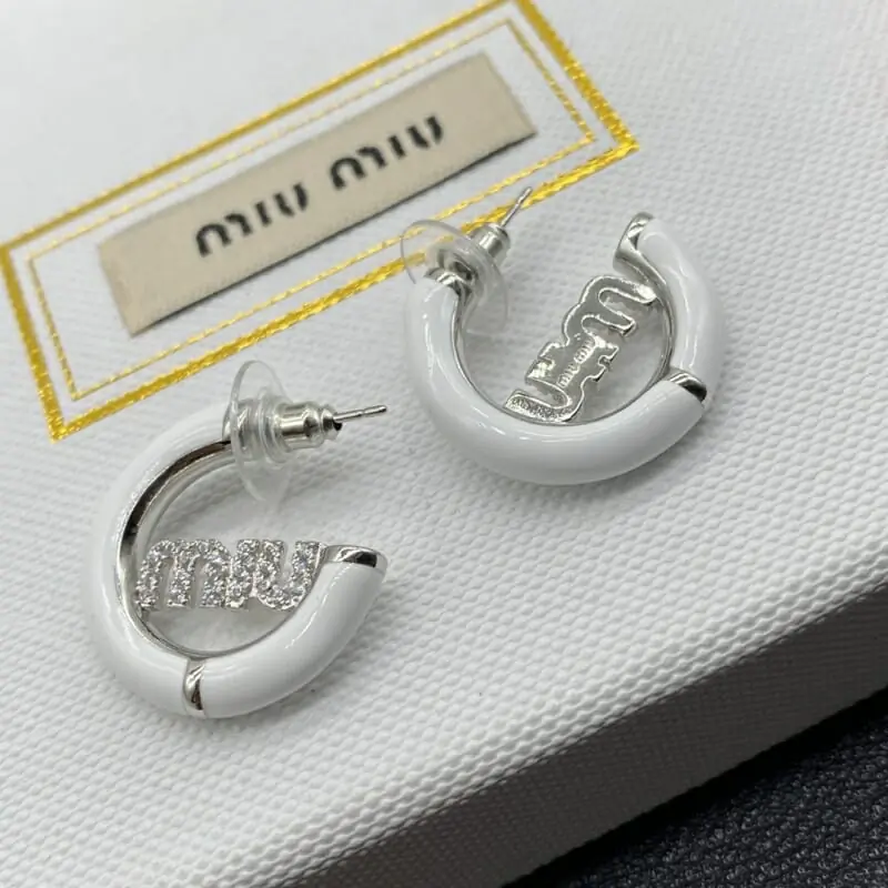 miu miu boucles doreilles pour femme s_12130341